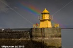Lighthouse and rainbow, Reykjavík harbour, Iceland